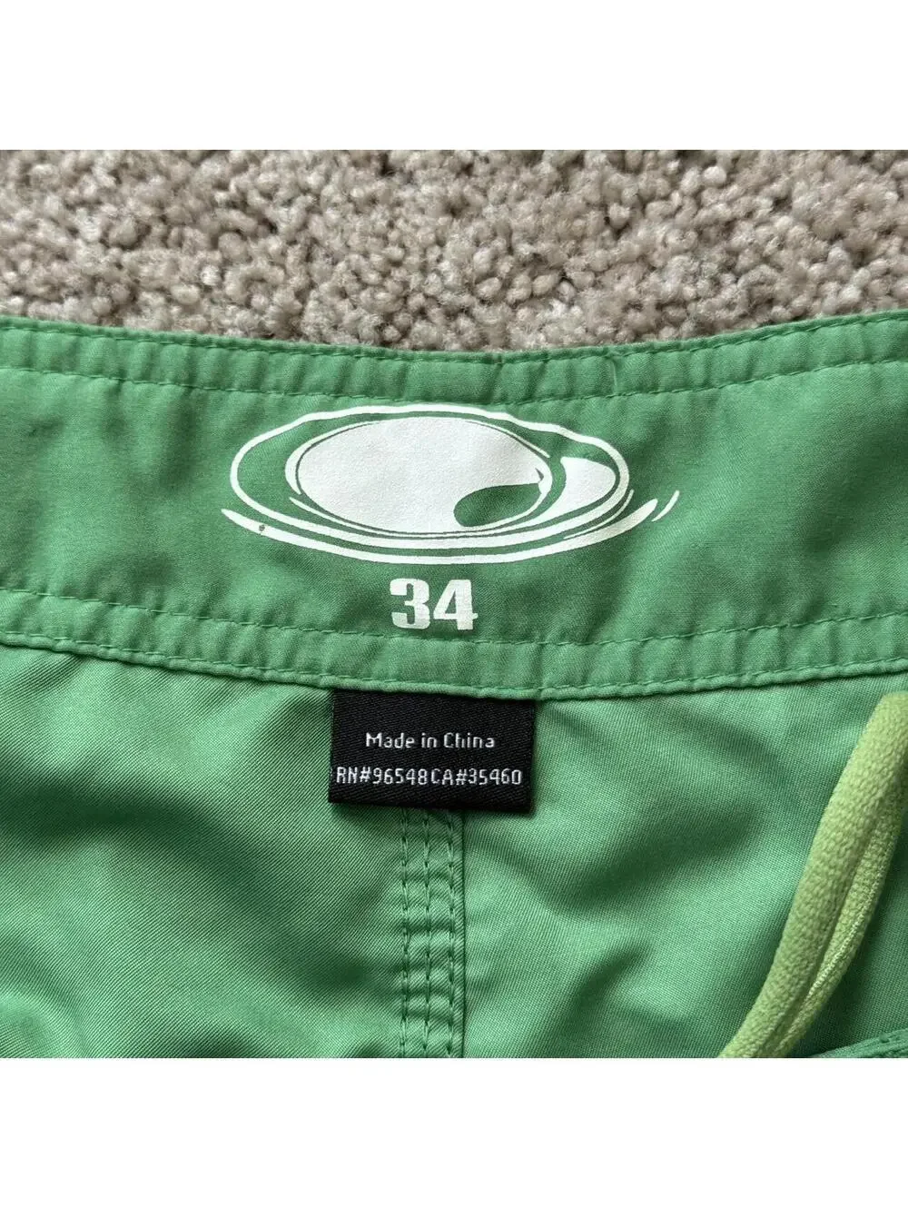 Y2k Green Oakley swim trunks with drawstring waist